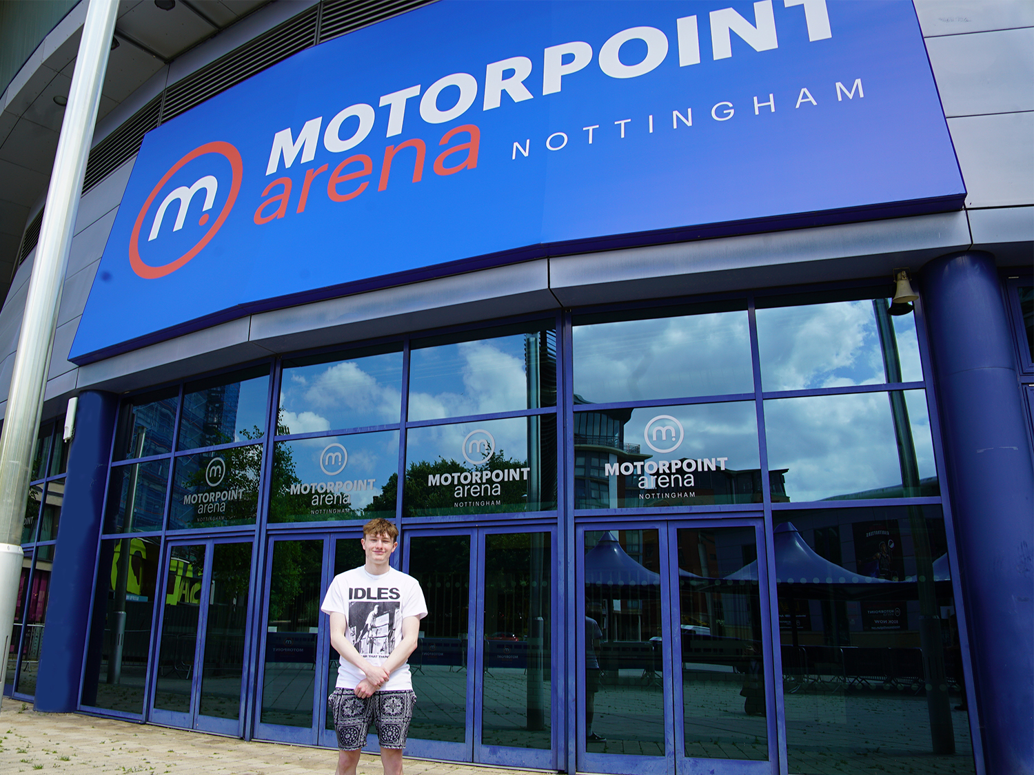 Brandon Campbell stood outside the front of Nottingham Motorpoint Arena - the place where he did his work experience