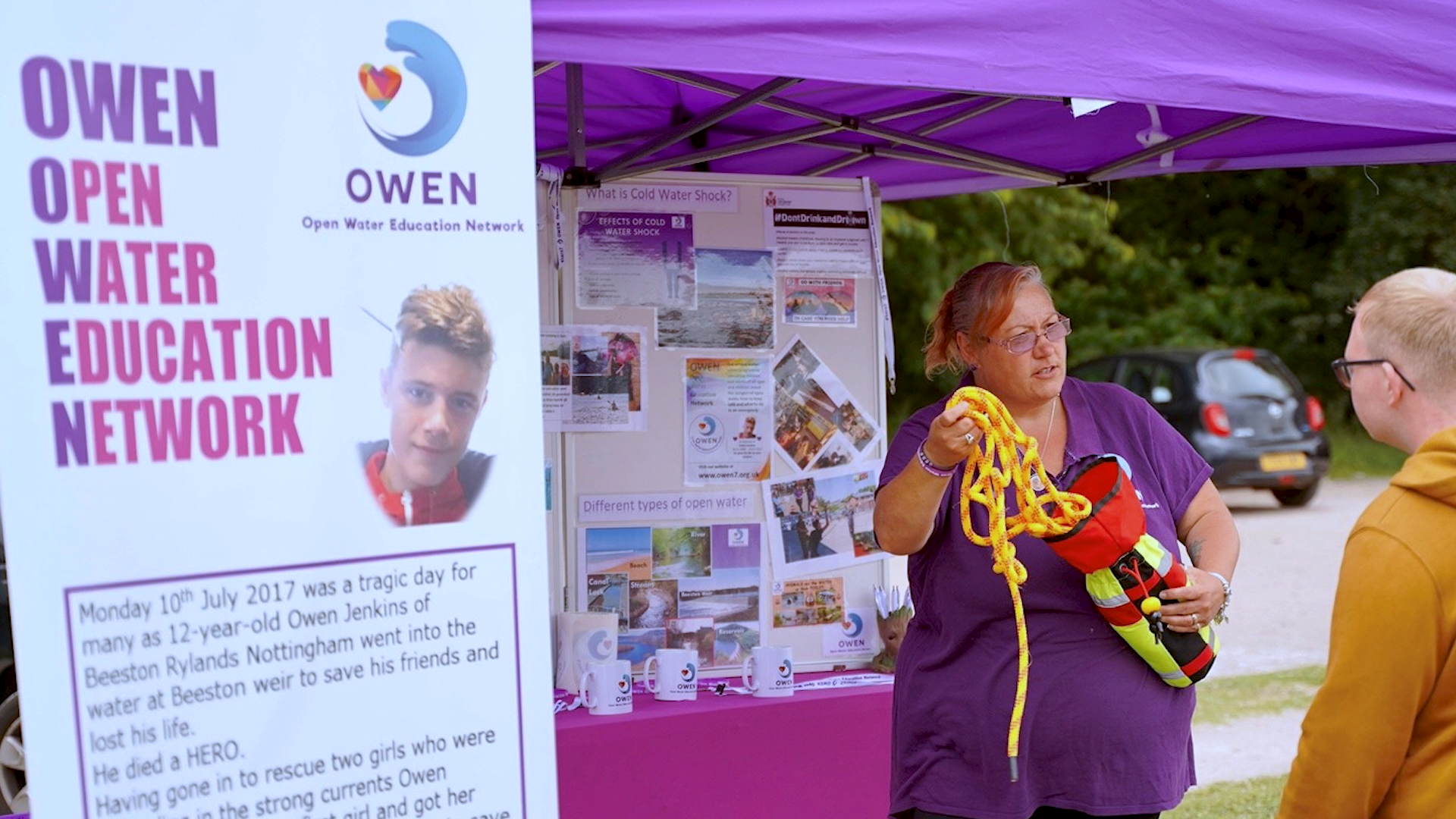 A woman campaigning for the Owen Open Water Education Network