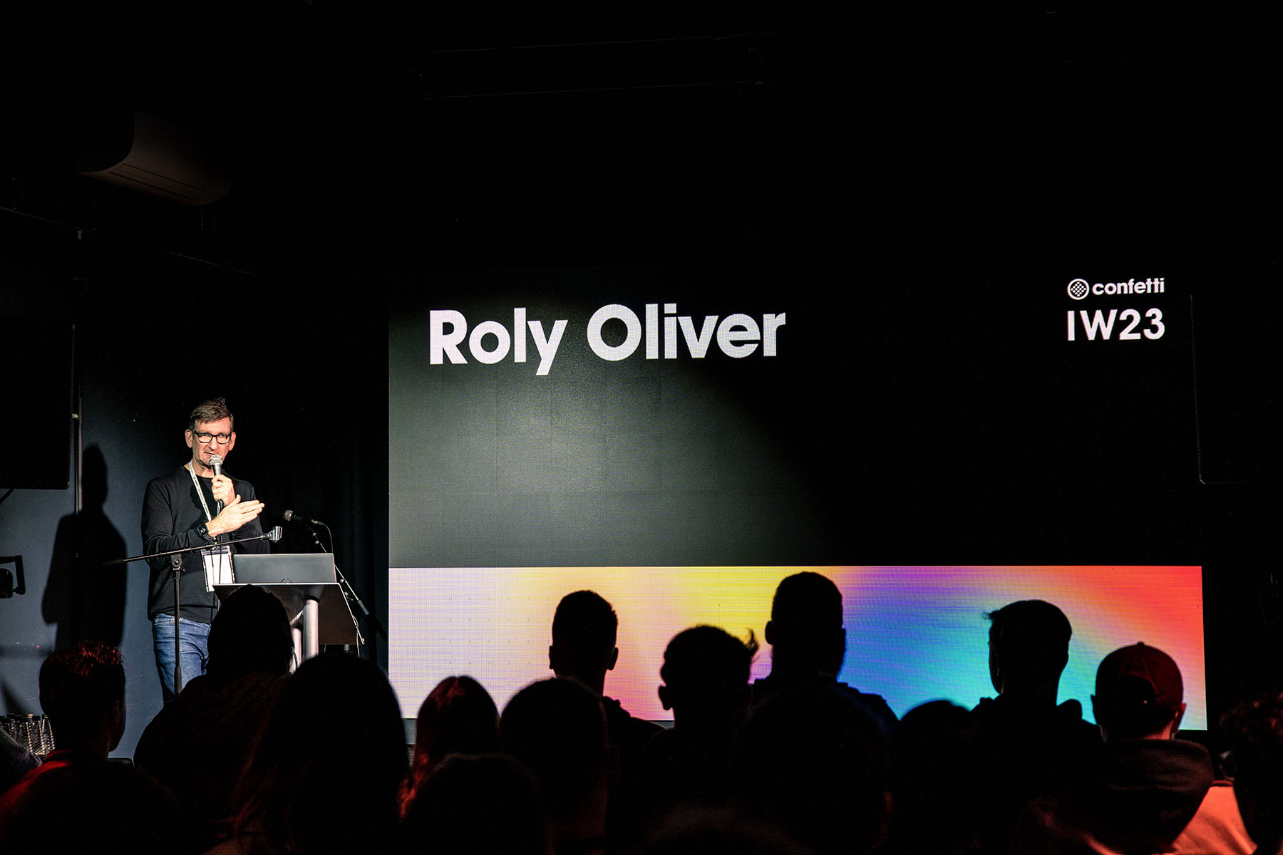 Roly Oliver on stage in Metronome, Nottingham giving a talk to students