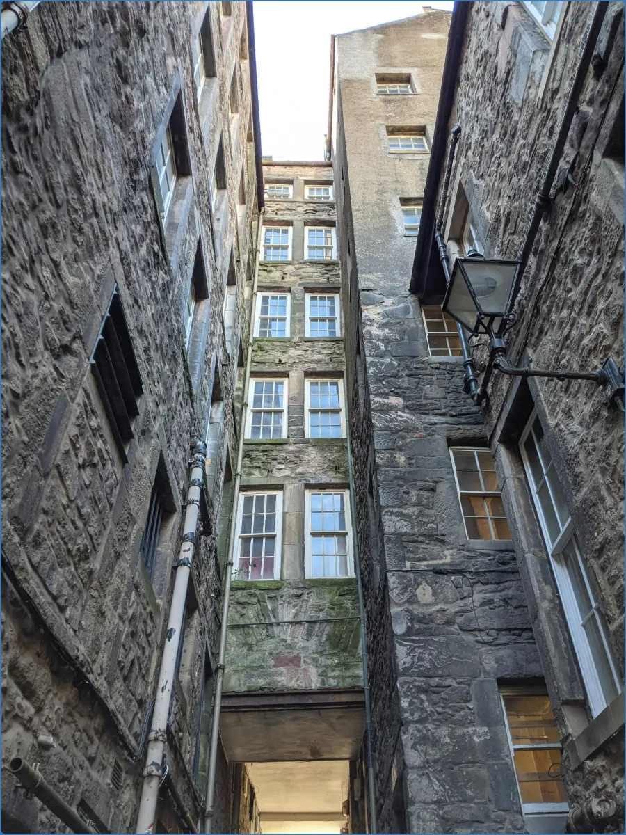 Narrow alley between old stone buildings