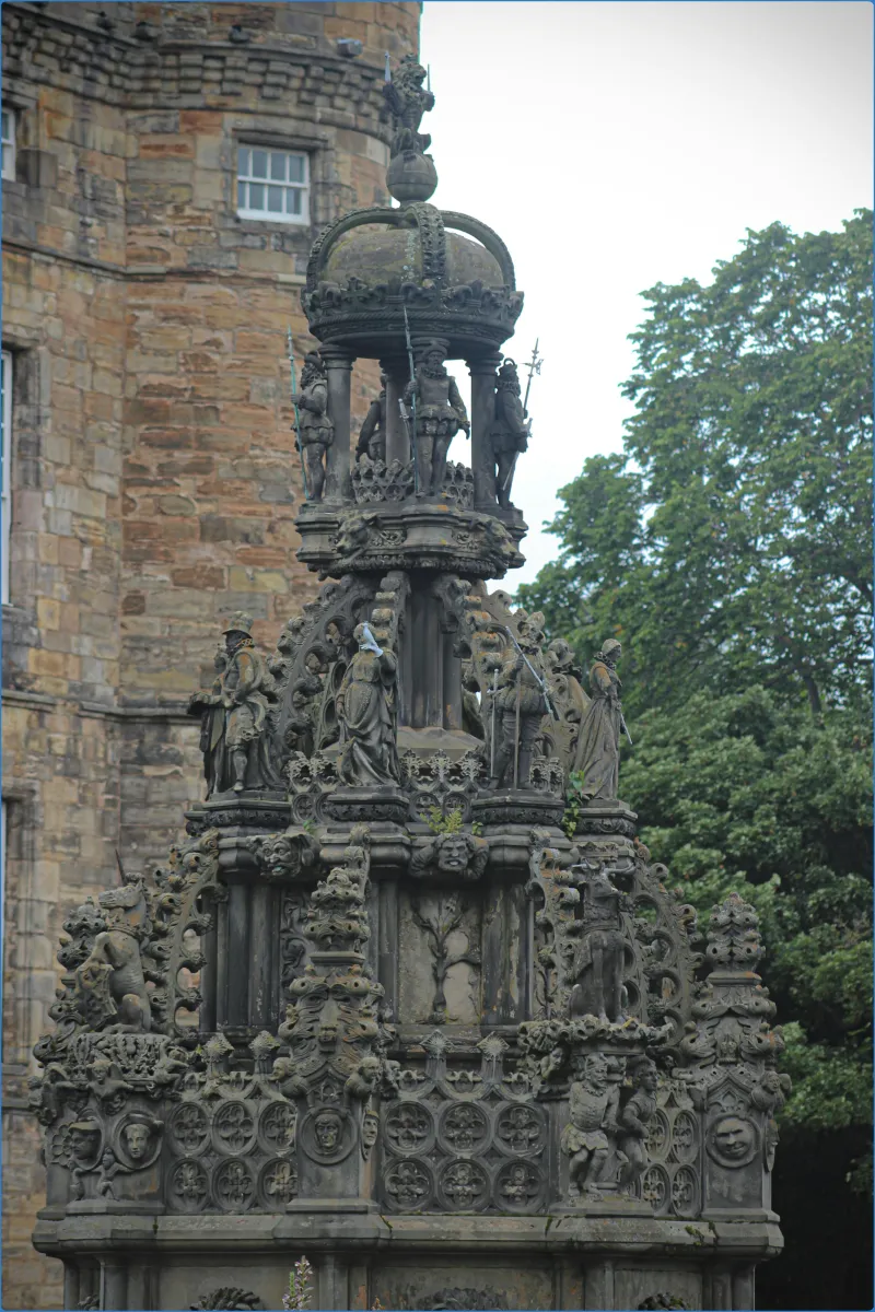 Ornate stone fountain with detailed sculptures