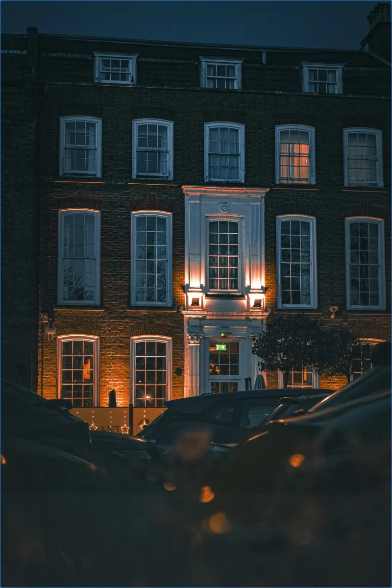 Illuminated building facade at night