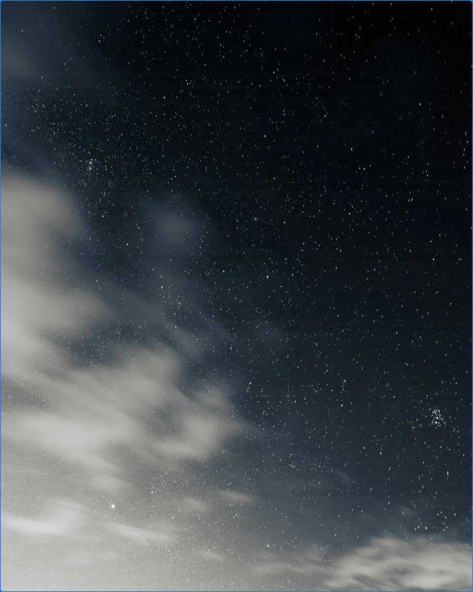 Starry night sky with scattered clouds