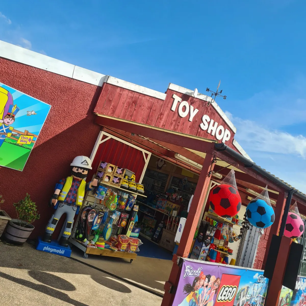 Exterior of a toy shop with colorful displays