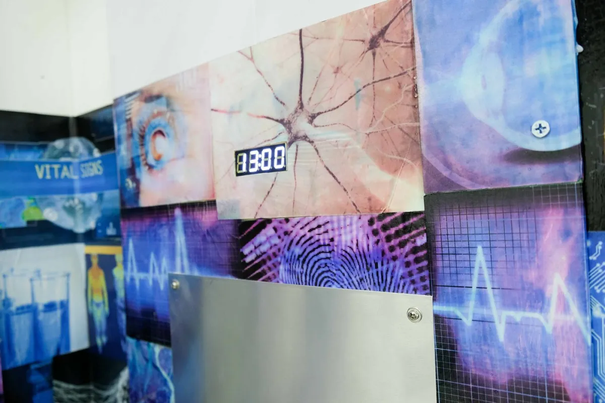Digital display with scientific graphics and vital signs.
