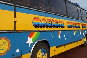 Colorful bus with 'Magical Mystery Tour' text.