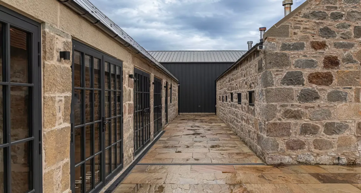Stone courtyard between two buildings