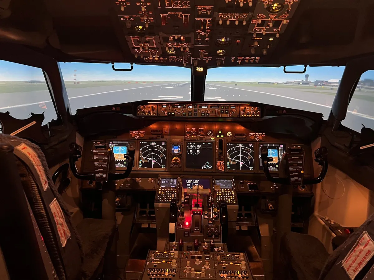 Cockpit of an aircraft with illuminated controls