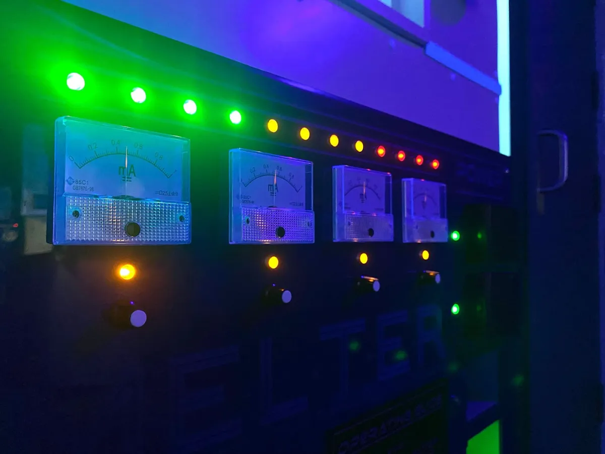 Control panel with colorful lights and meters