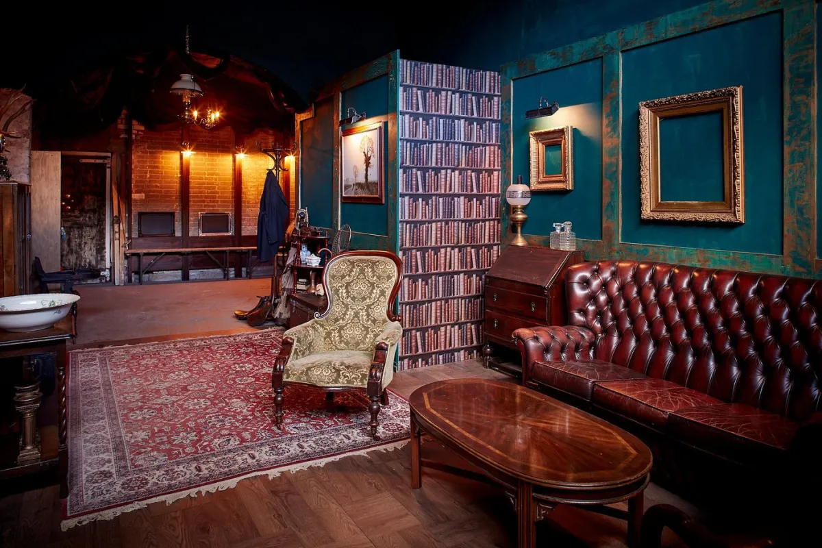 Vintage room with leather sofa and armchair.