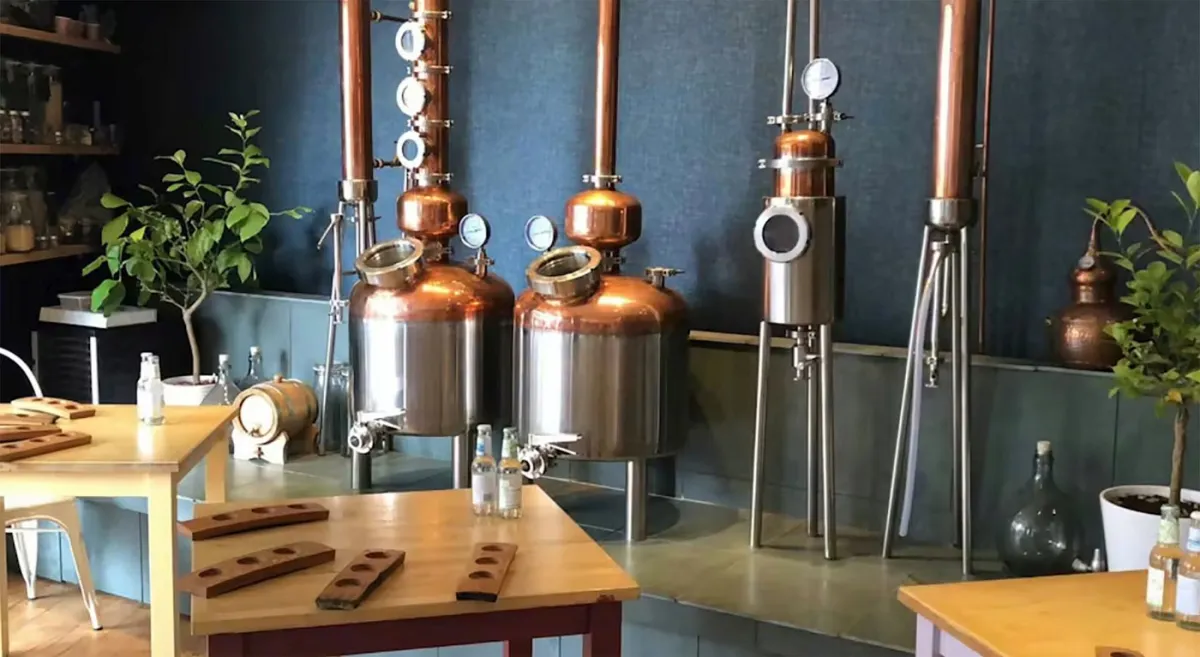 Distillery with copper and steel equipment.