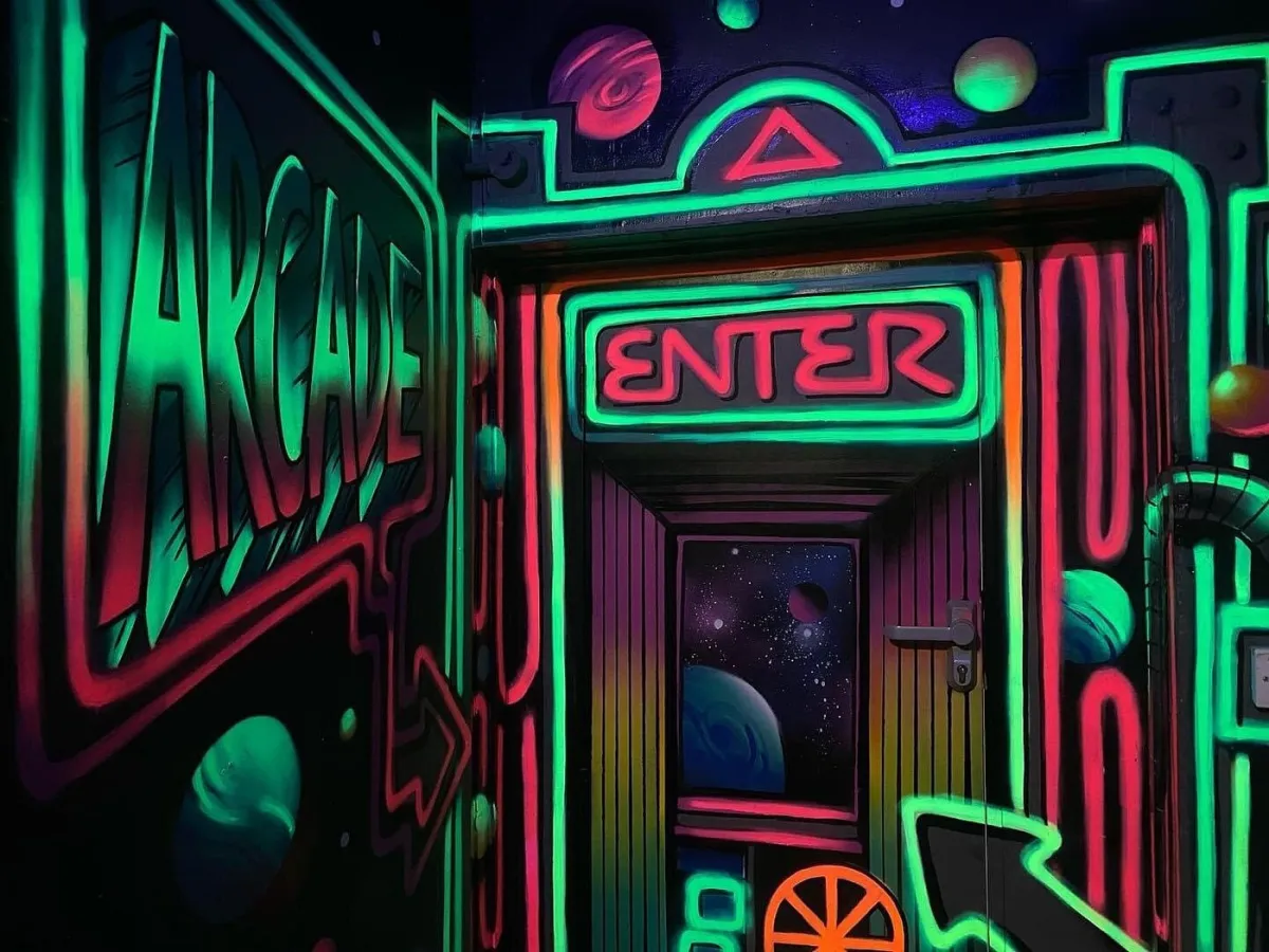 Neon arcade entrance with space theme