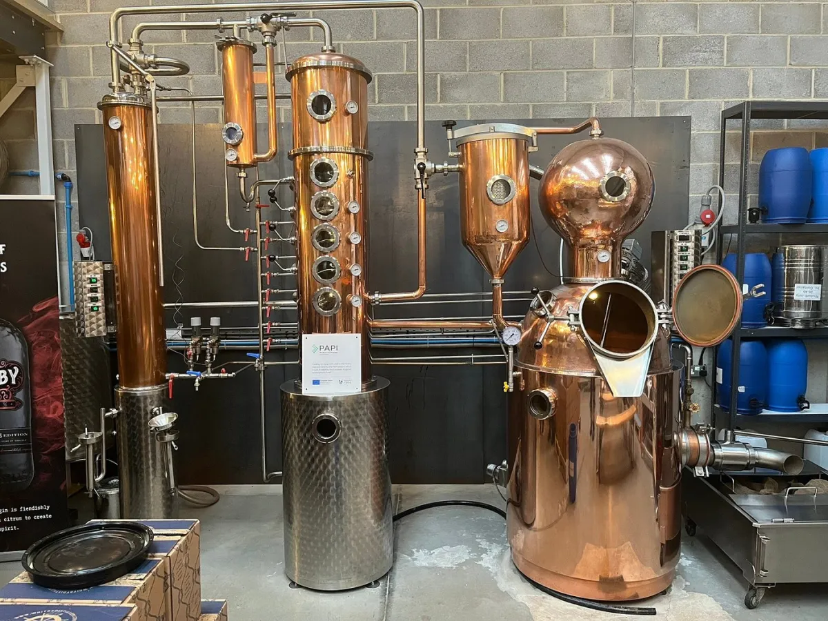 Copper distillation equipment in a distillery.