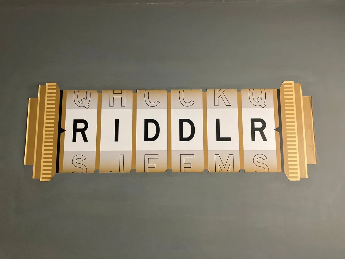 Word puzzle with letters spelling RIDDLR