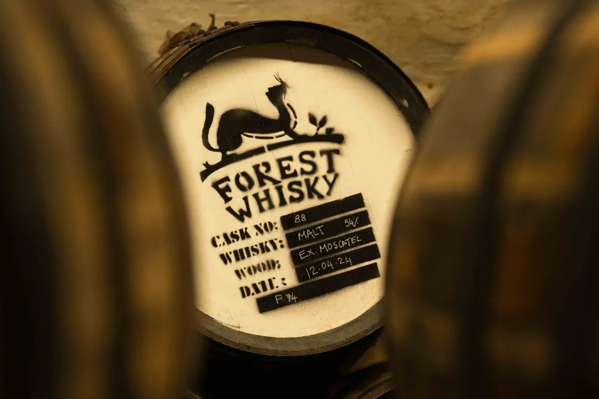 Close-up of a whisky barrel labeled Forest Whisky.