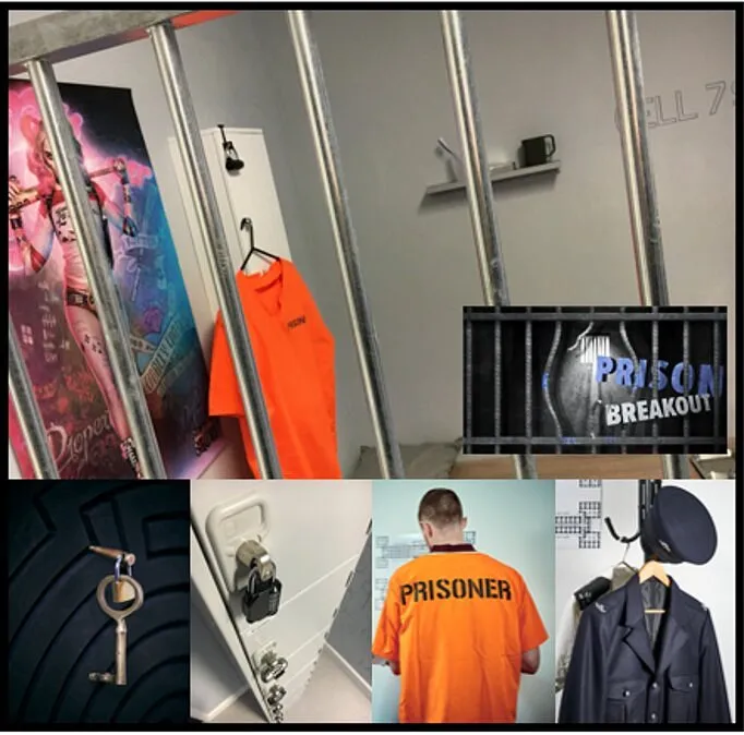 Prison-themed room with bars, orange jumpsuit, and key.