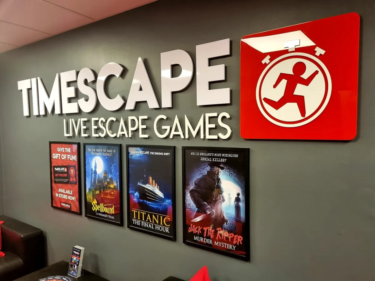 Timescape Live Escape Games wall display with posters.
