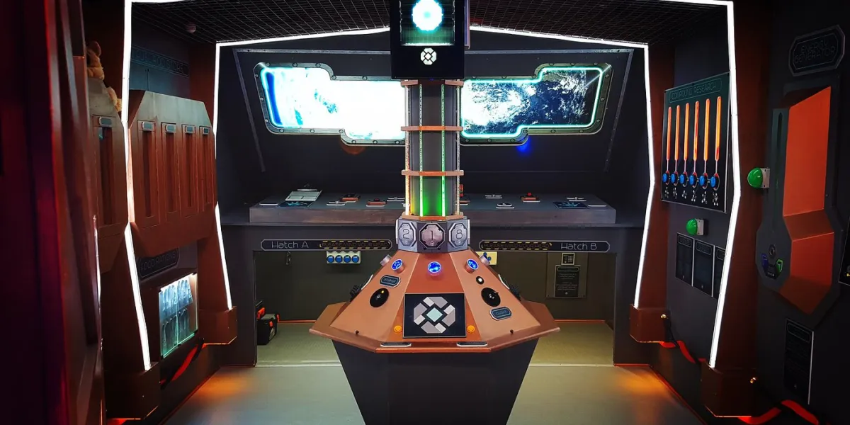 Futuristic control room with central console and screens.