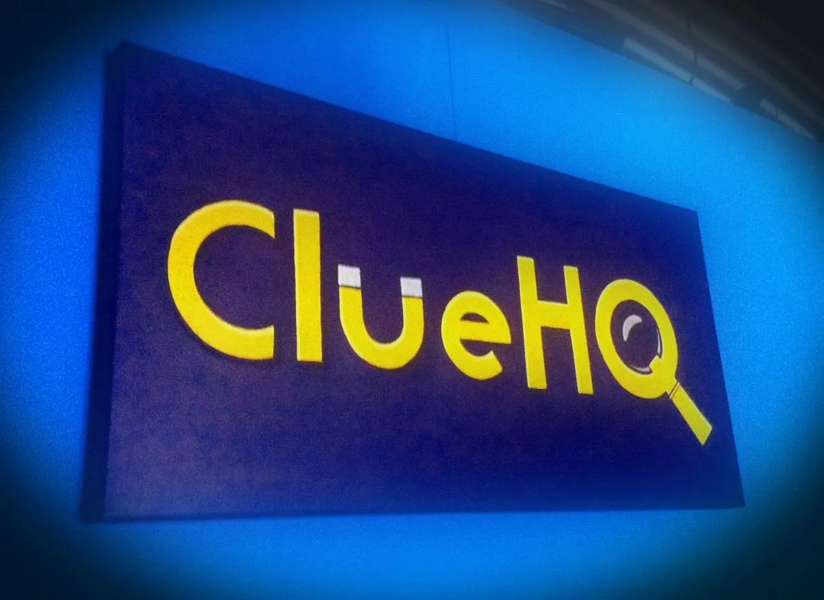 ClueHQ sign with magnifying glass design