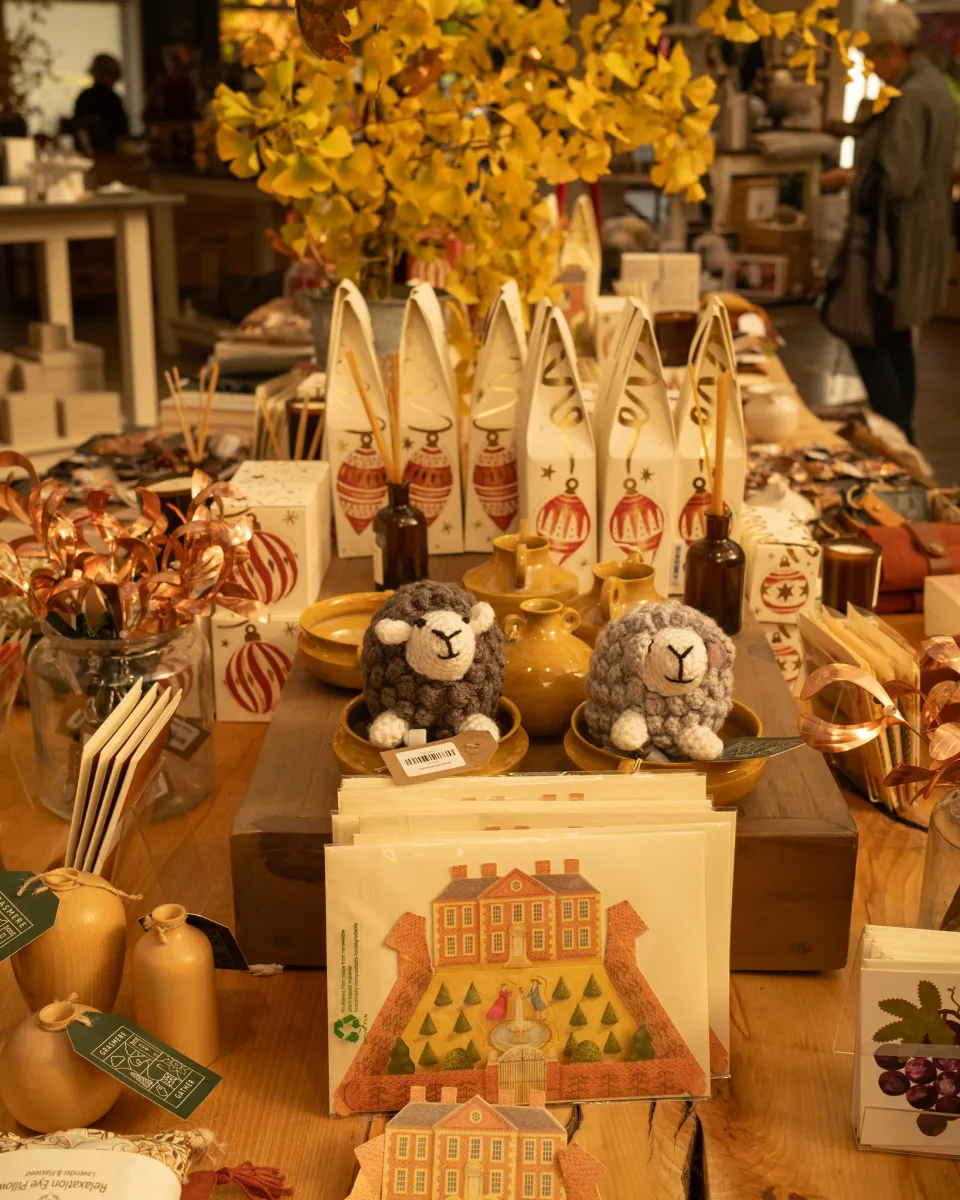 Craft store display with decorative items and cards.