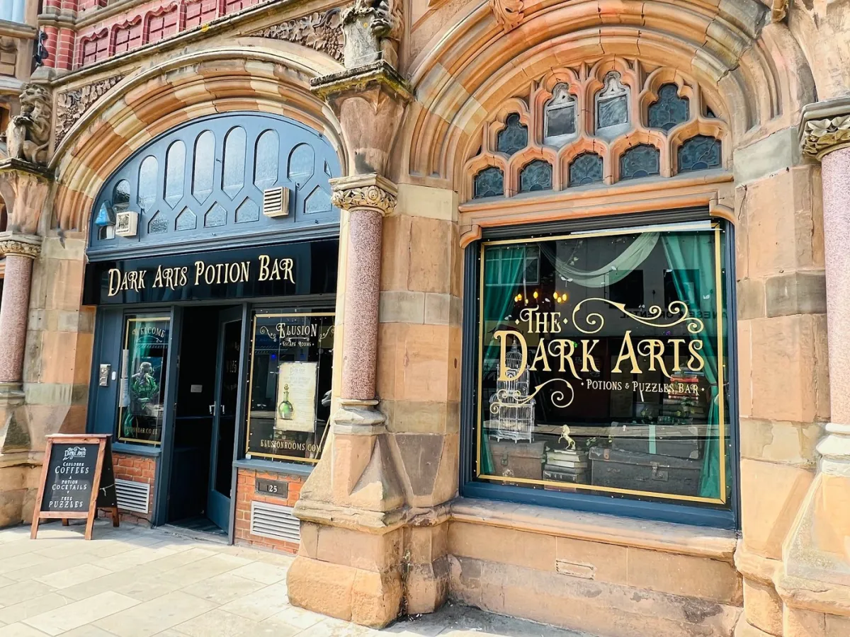 Entrance to Dark Arts Potion Bar with ornate facade.