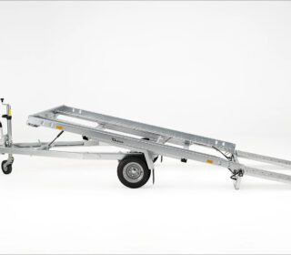 Debon small car transporter trailer tilted up with ramps down