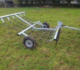 Scarrow trailed harrow behind a quad bike