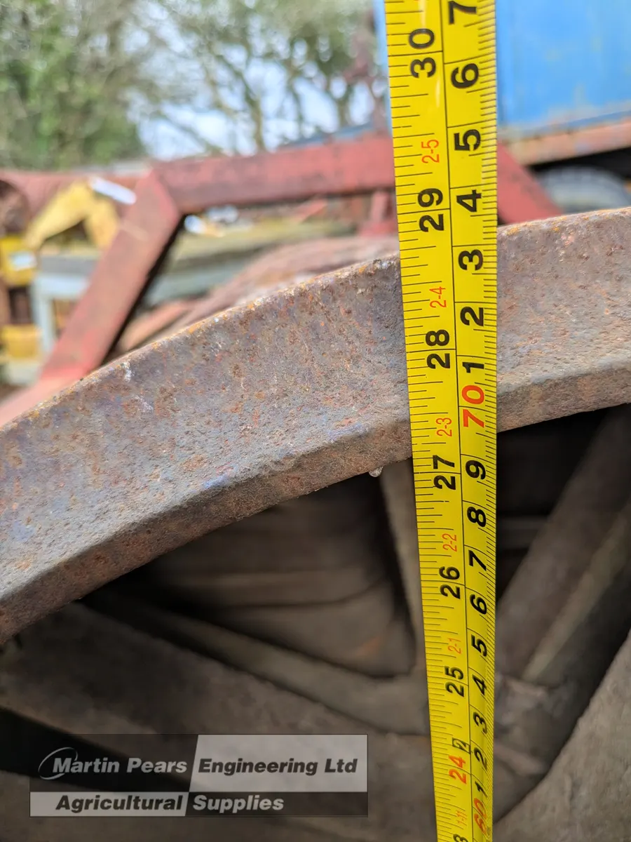 Tape measure measuring rolls height on Cambridge Roller