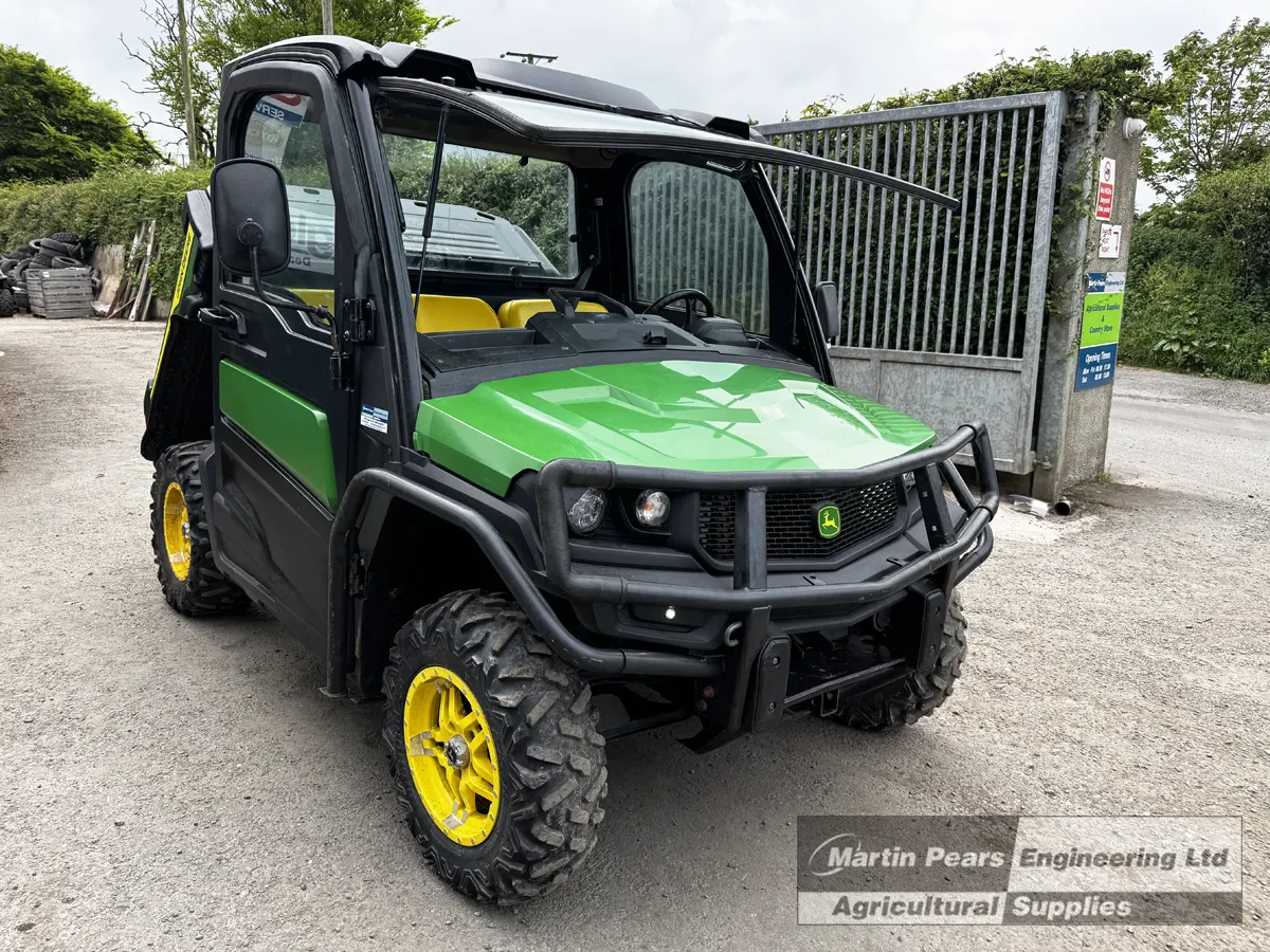 Jon Deere Gator with windscreen popped up