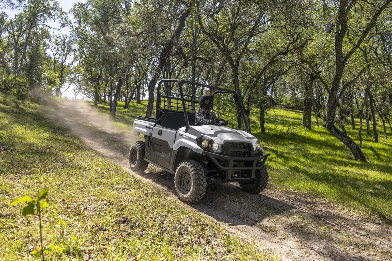 Kawasaki Mule Pro MX driving down a track