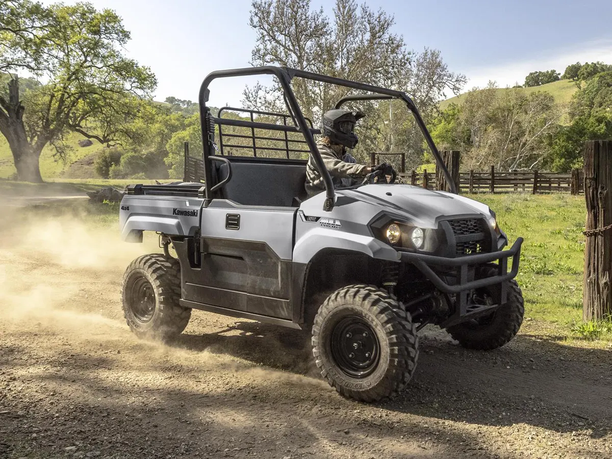 Kawasaki Mule Pro MX driving down a track