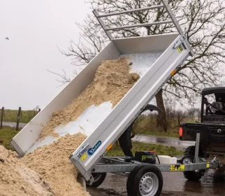 Debon PW0.1 Tipper Trailer fully tipped, with sand sliding out