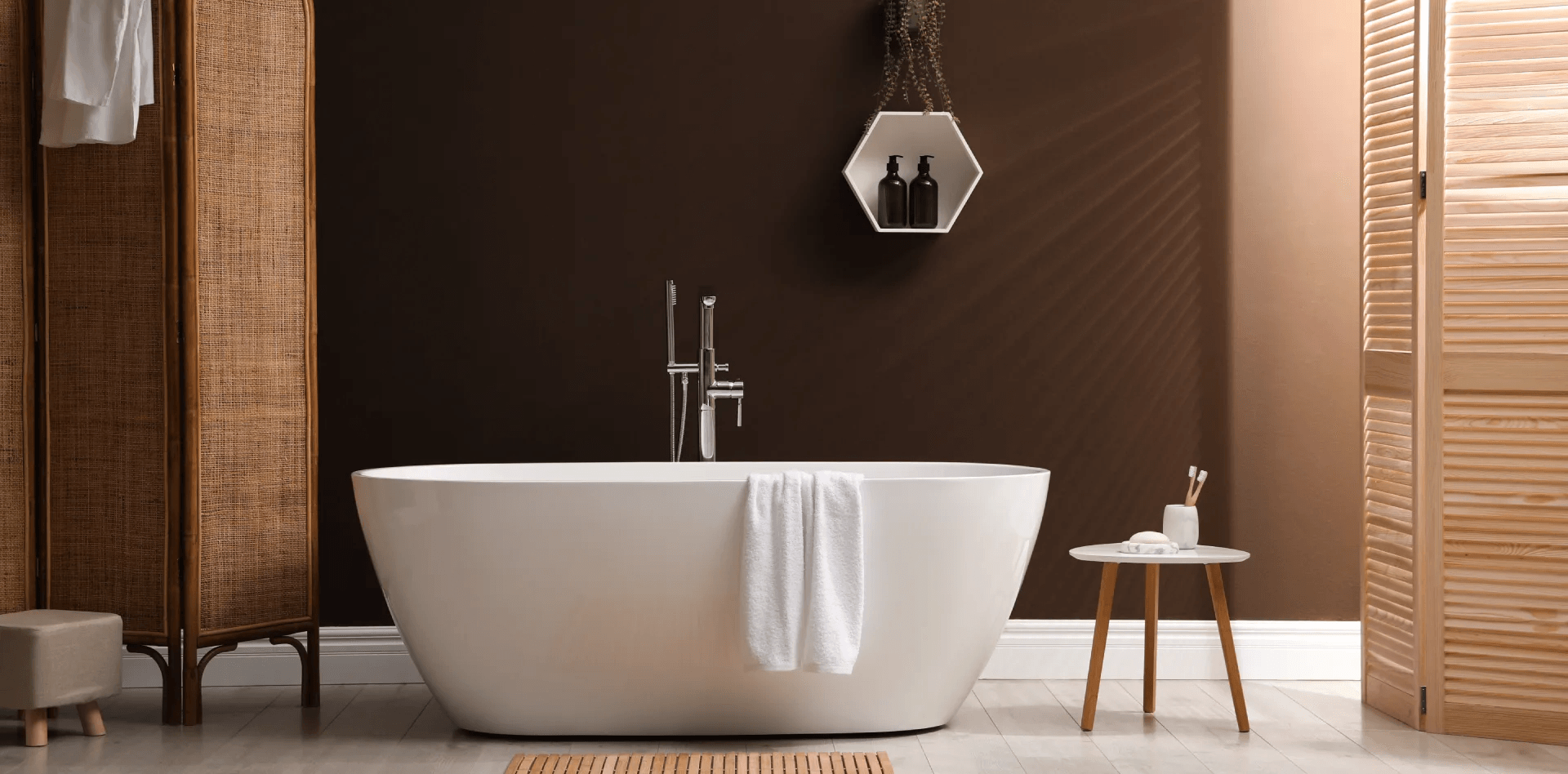 Luxury bathroom with freestanding bathtub and brass fixtures