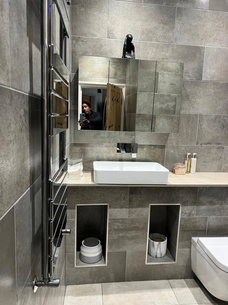 Meloart design consultation with architectural plans and material samples