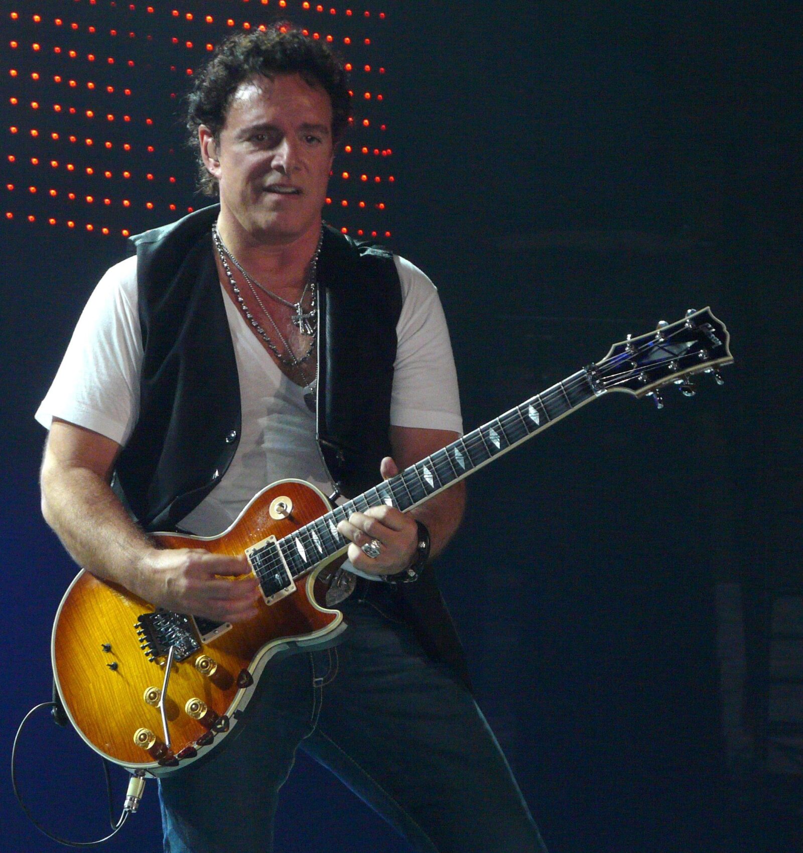 Neal Schon and Deen Castronovo of Journey defend Arnel Pineda