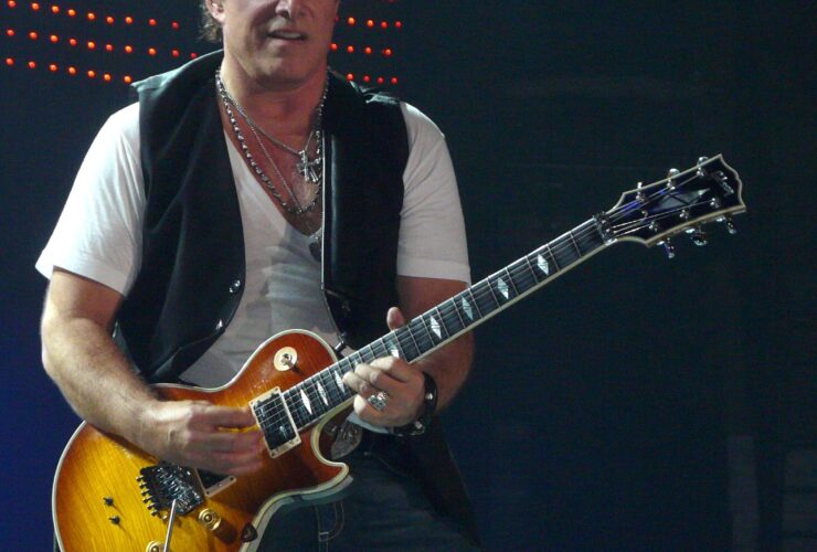 Neal Schon and Deen Castronovo of Journey defend Arnel Pineda