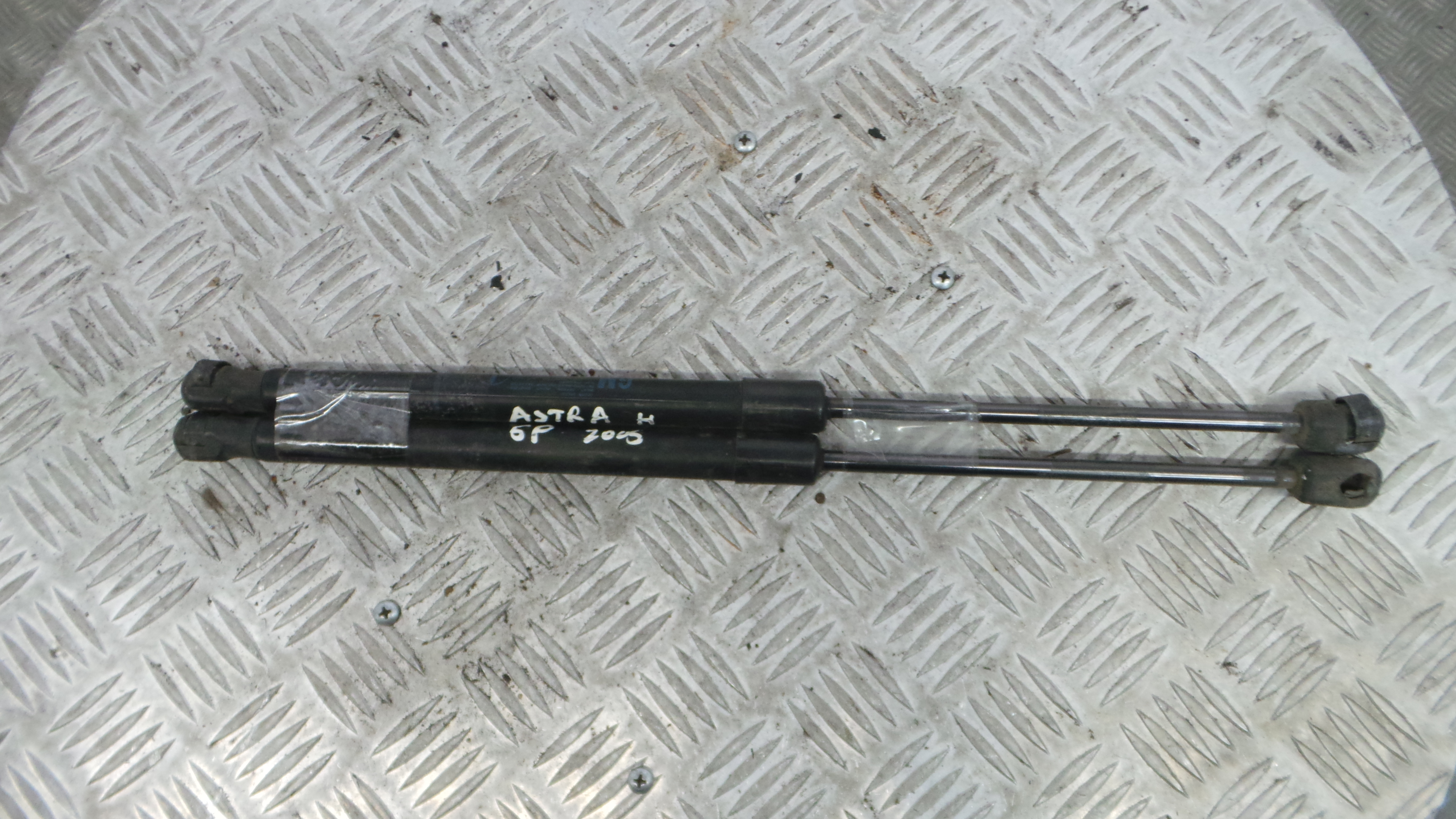 Amortecedor da Mala 24463829 - OPEL ASTRA H (A04)-33631058 Amortecedor da Mala 24463829 - OPEL ASTRA H (A04)-33631058