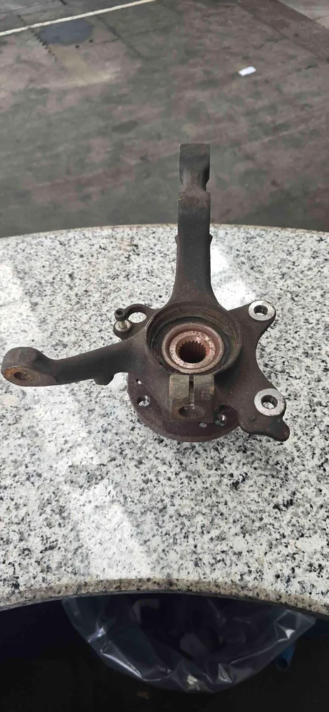 Left front steering knuckle