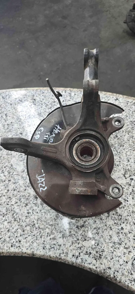 Left front steering knuckle