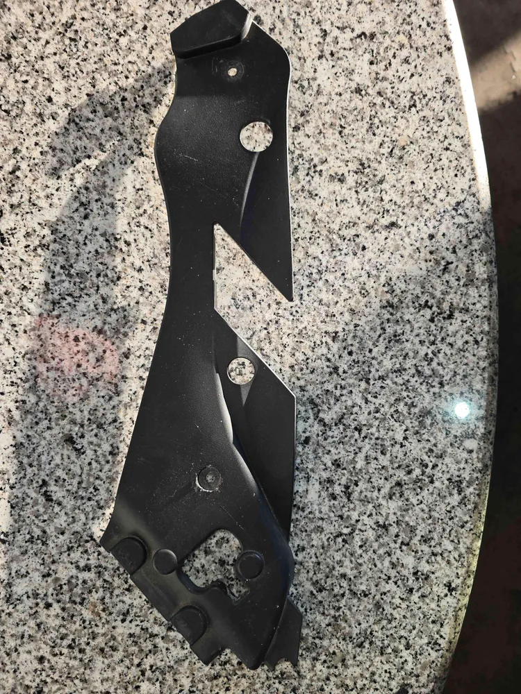Left headlight trim