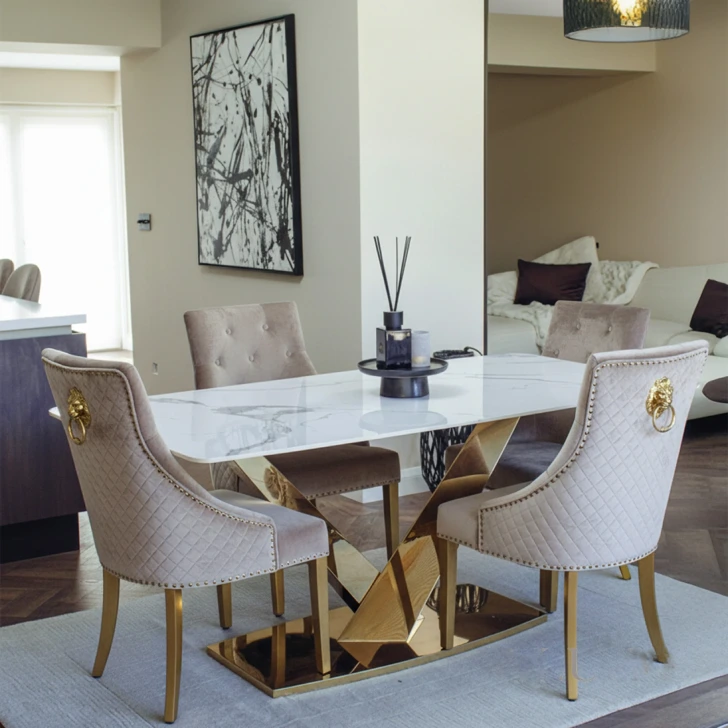 Set of dining chairs with gold legs