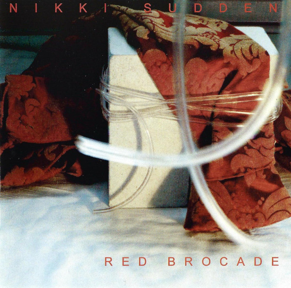 NIKKI SUDDEN — RED BROCADE