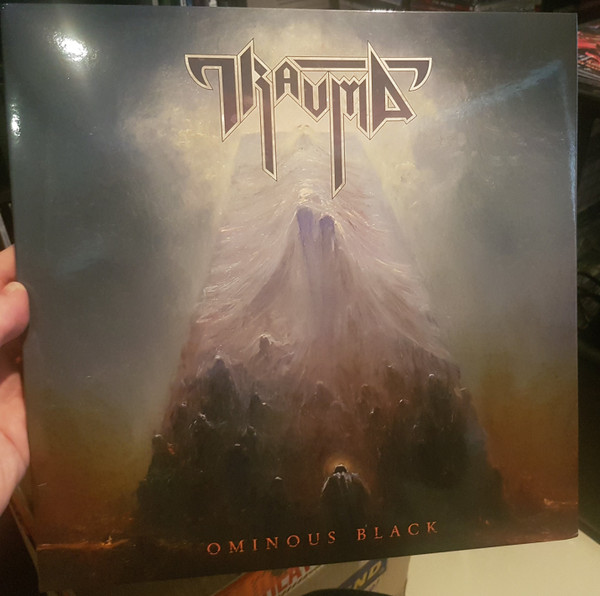 TRAUMA — Ominous Black
