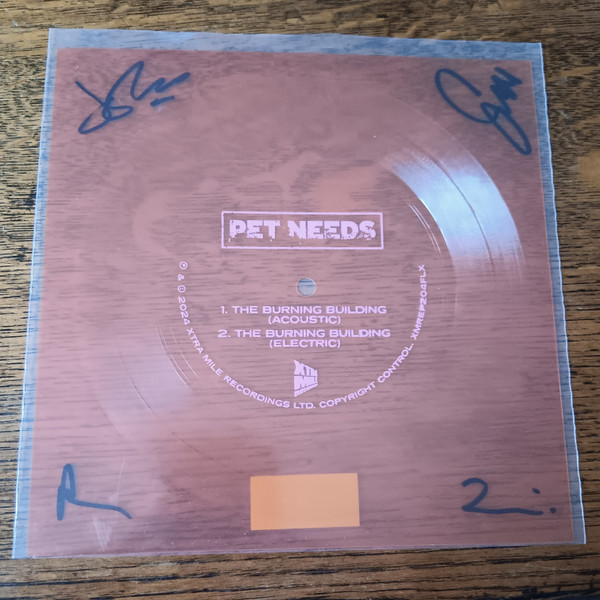 PET NEEDS — BURNING BUILDINGTHE